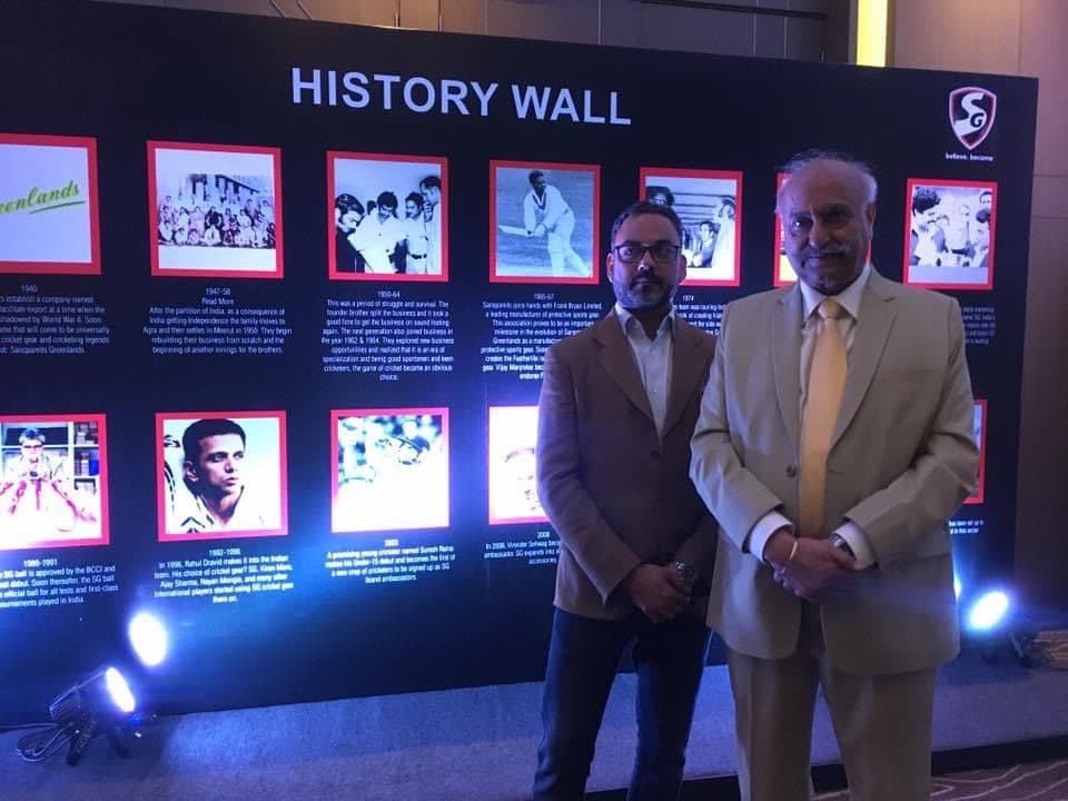 Haute Services founder Maneesh Baheti pictured with a celebrity at an upscale hospitality or lifestyle event