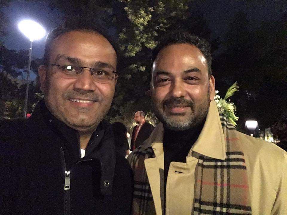 Haute Services founder Maneesh Baheti image with a celebrity celebrating excellence in hospitality and gastronomy