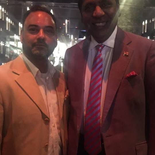 Haute Services founder Maneesh Baheti with a celebrity at a cultural or hospitality industry event